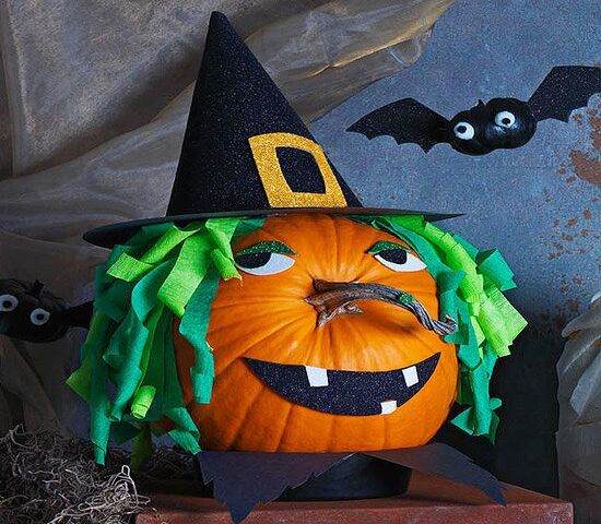 Pumpkin with bats and witches